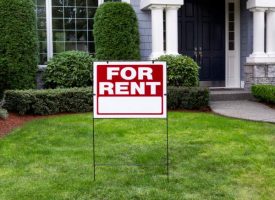 for-rent-sign-in-front-yard