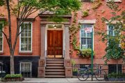 brick-brownstone-with-trees-and-bicycle-on-sidewalk